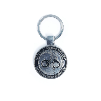 No Guns Just Guts Keychain – A Bold Statement of Strength and Resilience
